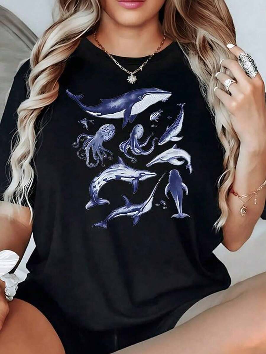 Ilustración de ballenas delfines y pulpos que simboliza la conexión entre la libertad marina y la serenidad del océano camiseta para mujer 100% algodón suave y cómoda