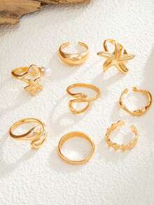 Set de 8 piezas de anillos abiertos con estrellas de mar y conchas de estilo vacacional, un conjunto de joyas de anillos nudillares únicos - Juego de 8 anillos con forma de estrella de mar - Ver 4