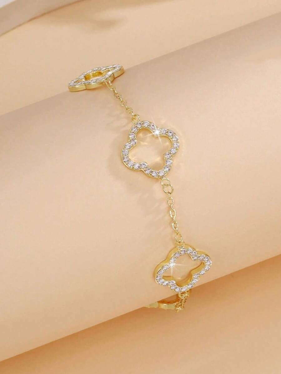 1. Vòng tay cỏ ba lá may mắn với thiết kế rỗng, thời trang và đơn giản, toát lên vẻ sang trọng và đa năng dành cho các cô gái. - Vàng - Xem 1