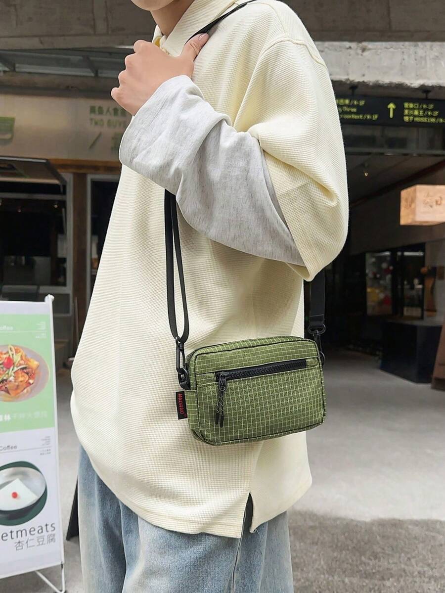 男女通用格子斜挎包,两种颜色可选,适合情侣、街头服饰和日常使用。 - 彩色 - 查看 1