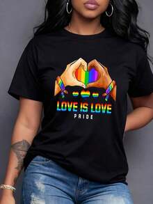 Minimalist Women's T-Shirt With A Graphic Print Of "Love Is Love" And Rainbow Hearts, Ideal For Celebrating Pride In Style And Comfort. Modern And Cheerful Design On Soft, Breathable Fabric. Simple Solid Color Women's T-Shirt With A Relaxed Yet Fitted Cut And Casual Short Sleeves. - 黑色 - 查看 7