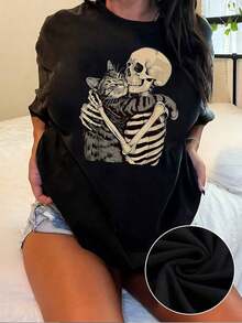 Camiseta con Estampado de Gato Acogedor y Abrazo de Esqueleto para Mujer, Camiseta de Manga Corta Estilo Halloween, Linda y Espeluznante, Top de Algodón de Corte Relajado con Estampado Artístico de Moda, Prenda Casual Única - Negro - Ver 5