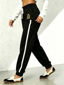 Pantalones largos informales sólidos con efecto de mezclilla y encaje lateral para mujeres - Negro - Ver 3