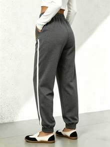 Pantalones largos informales sólidos con efecto de mezclilla y encaje lateral para mujeres - Gris Oscuro - Ver 3