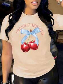 Oversized White T-Shirt With Cherries And A Blue Bow, Ideal For Casual Summer Outfits. Loose-Fitting Youth T-Shirt With A "Fresh Cherries" Cherry Design, A Flirty Style To Combine With Jeans Or Shorts. Summer T-Shirt With A Cherry Graphic And Text, A Feminine And Flattering Style. - YH433-杏色 - 查看 1