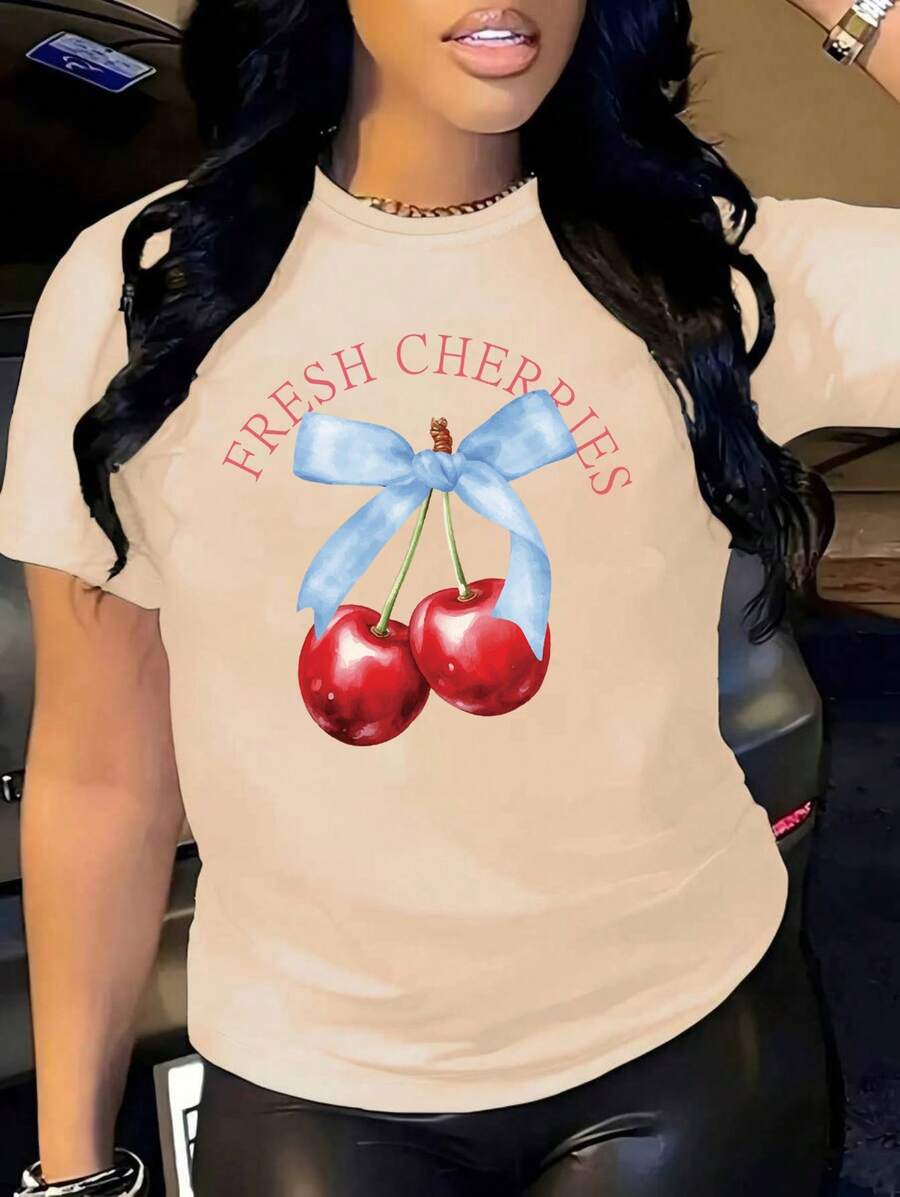 Oversized White T-Shirt With Cherries And A Blue Bow, Ideal For Casual Summer Outfits. Loose-Fitting Youth T-Shirt With A "Fresh Cherries" Cherry Design, A Flirty Style To Combine With Jeans Or Shorts. Summer T-Shirt With A Cherry Graphic And Text, A Feminine And Flattering Style. - YH433-杏色 - 查看 1