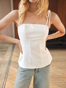 Camiseta sin mangas de verano para mujer, con un diseño de unicolor minimalista y cintura ceñida para una silueta favorecedora.Elegante pero sencilla, adecuada para ocasiones formales como conciertos y actuaciones, así como para un uso casual - Blanco - Ver 6