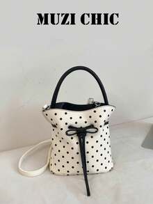 This Black And White Polka Dot Drawstring Bucket Bag Features A Bow Decoration That Adds A Touch Of Girlish Charm. Made Of Durable And Easy-To-Care-For PU Material, It Can Be Carried By Hand Or Worn Crossbody. Simple And Versatile, It's Perfect For Female College Students Commuting To Class, Going Out On Campus, Or Shopping With Friends. - White - View 1