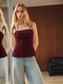 Camiseta sin mangas de verano para mujer, con un diseño de unicolor minimalista y cintura ceñida para una silueta favorecedora.Elegante pero sencilla, adecuada para ocasiones formales como conciertos y actuaciones, así como para un uso casual - Burdeos - Ver 1