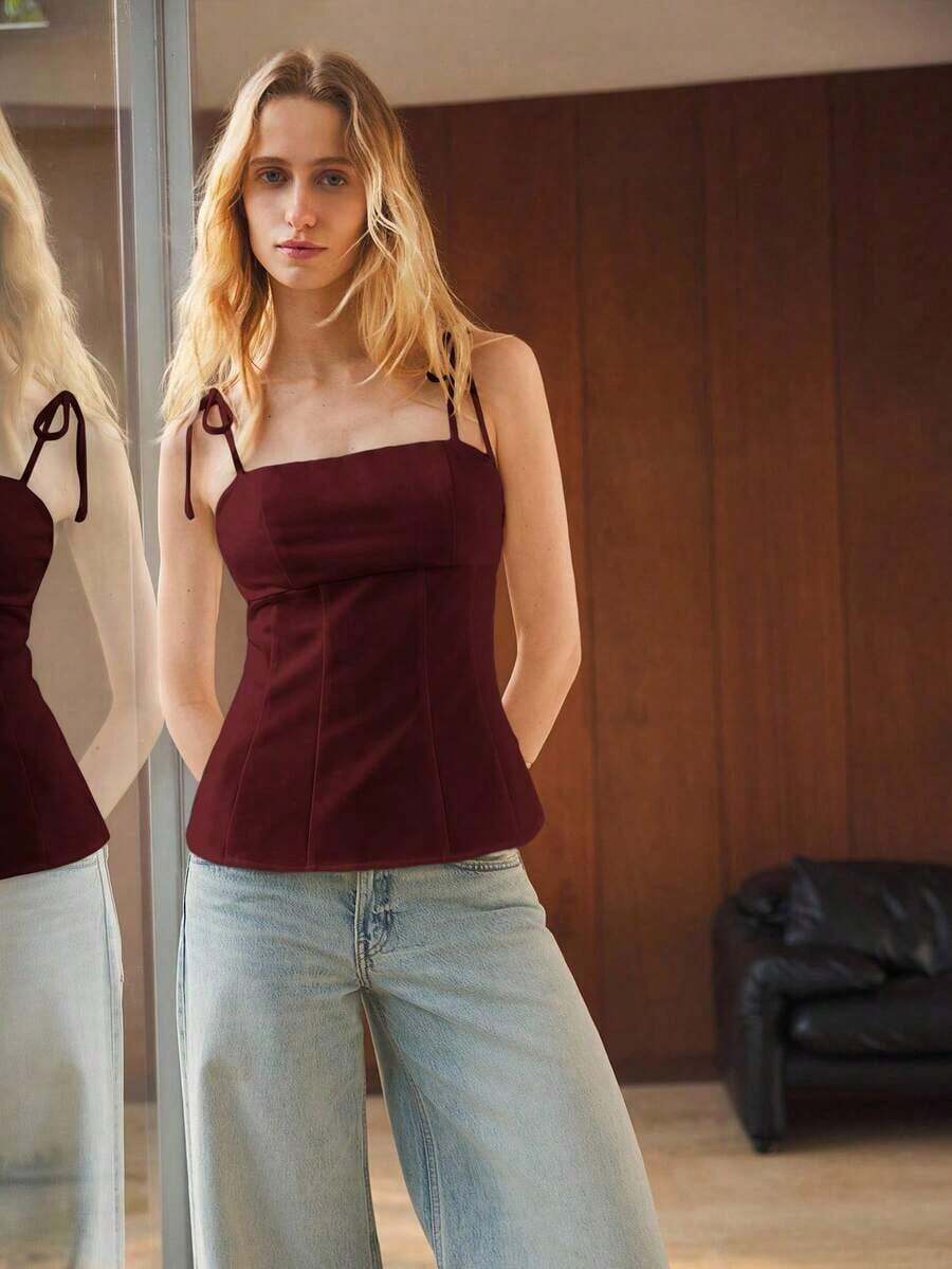 Camiseta sin mangas de verano para mujer, con un diseño de unicolor minimalista y cintura ceñida para una silueta favorecedora.Elegante pero sencilla, adecuada para ocasiones formales como conciertos y actuaciones, así como para un uso casual - Burdeos - Ver 1