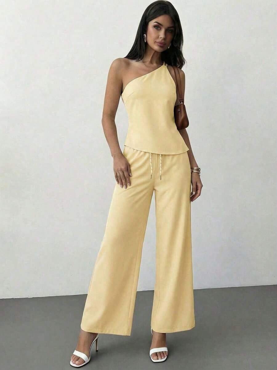 Nueva llegada Primavera/Verano Elegante Top casual de lino color albaricoque con cintura fruncida, bajo asimétrico y espalda descubierta - Amarillo claro - Ver 1