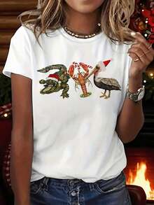 Camiseta de HeavyweightWo con estampado de pelícano tropical, cocodrilo, aligátor y loro con gorro de Papá Noel - Camiseta ligera de manga corta y cuello redondo para verano - Ropa de playa casual para conjuntos de primavera y verano, ajuste cómodo para vacaciones en Florida y fiestas en la piscina. Idea de regalo. - Blanco - Ver 1