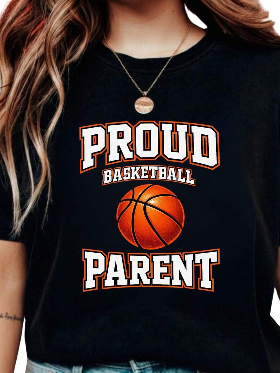 Camiseta "Orgulloso Padre de Baloncesto", Regalo para Mamá y Papá Baloncestistas, Camiseta Gráfica Familiar Deportiva, Camiseta de Orgullo para el Día del Partido. Camiseta unisex de algodón puro de 220 g, peso ideal para todas las estaciones, adecuada tanto para hombres como para mujeres. Tejido duradero de alta calidad, suave al tacto y de larga duración. Parte superior transpirable. Adecuada para mujeres en primavera y verano, vacaciones, Día de la Madre, Día de la Independencia. - Negro - Ver 1