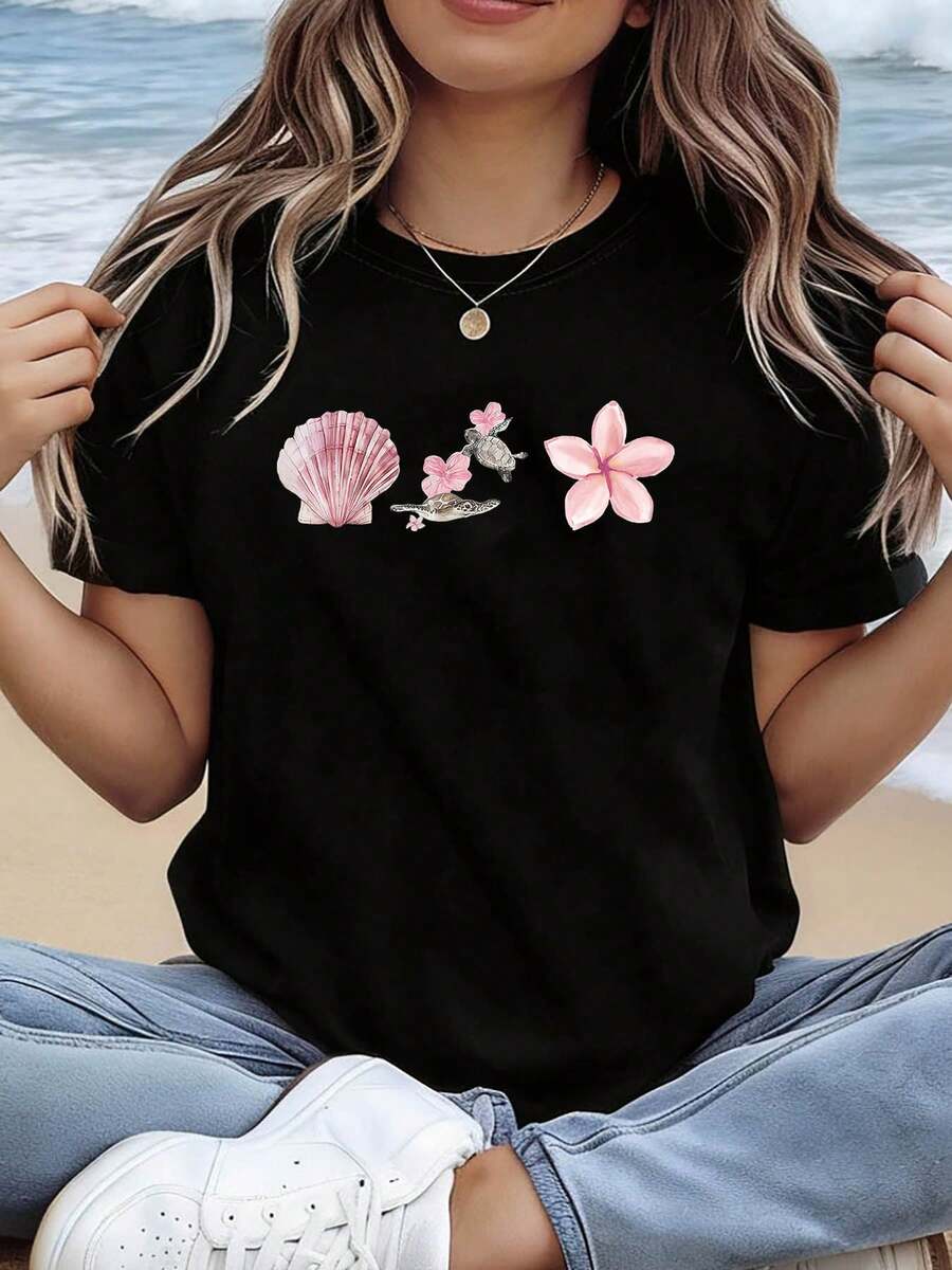 Camiseta de manga corta para mujer, estilo isleño de ensueño, con cuello redondo y estampados de conchas, tortugas marinas y flores de plumeria, ideal para compras informales, regalos de vacaciones, reuniones con amigos, fiestas de música y ropa de vacaciones. - Negro - Ver 1