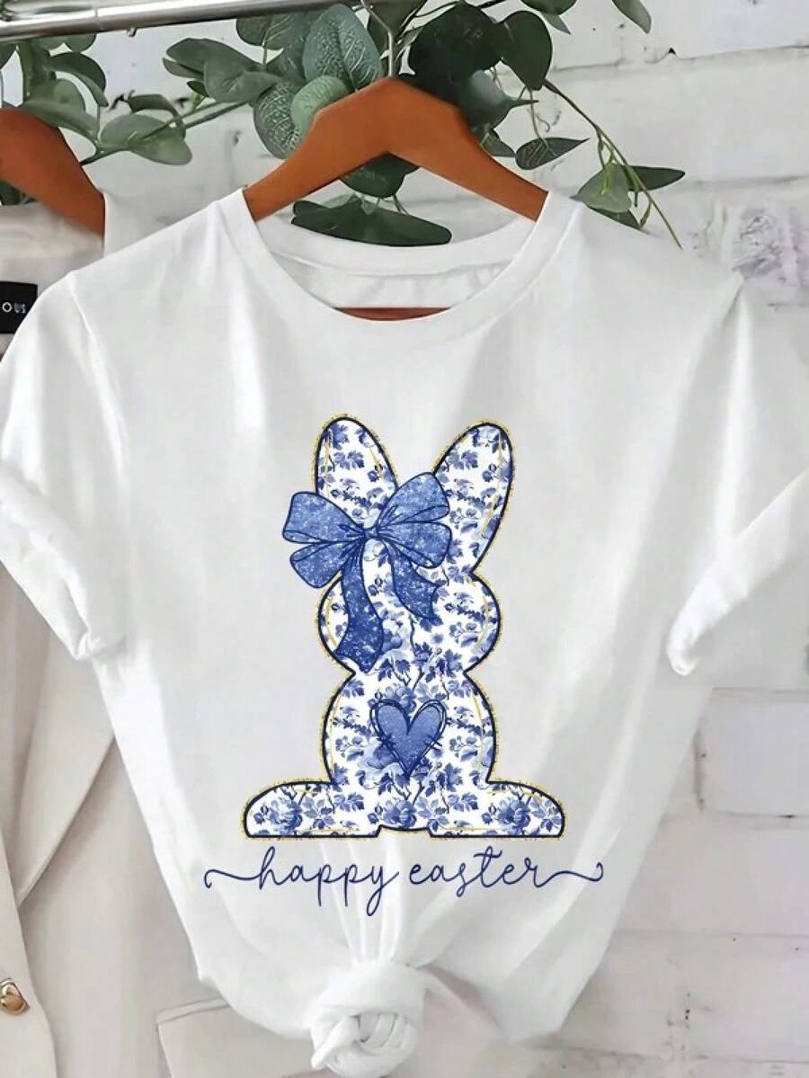 Camiseta gráfica de Pascua, Top casual de manga corta y cuello redondo estampada, con estampados de conejo, flores y moños para mujeres - Negro - Ver 1
