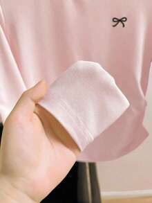 Camiseta casual de manga larga, cuello redondo, con estampado de lazo, color negro para mujer - Rosa Pálido - Ver 4