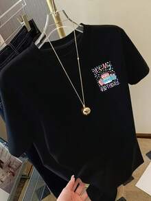 Camiseta de manga corta con cuello redondo para mujer, estilo retro de vacaciones, nueva colección 2026, con estampado, para compras informales, regalos de vacaciones, reuniones con amigos, fiestas deúsica y ropa de vacaciones. - Negro - Ver 2