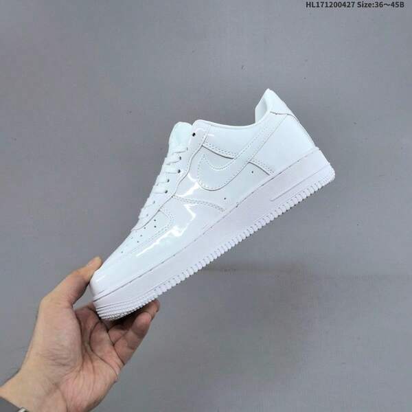 Zapatillas casuales de caña baja blancas con acabado brillante de charol, zapatos cómodos y acolchados de uso diario