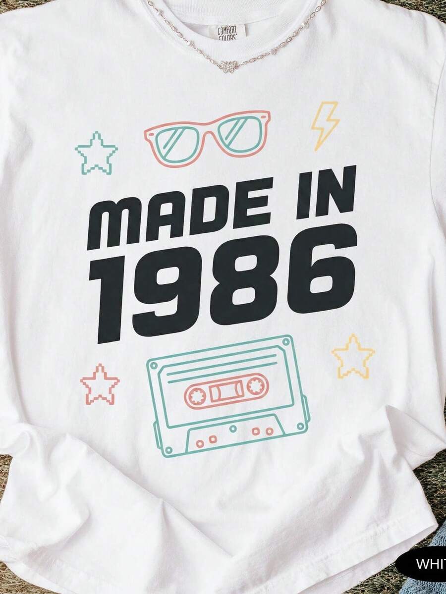 40th Birthday T-Shirt, Vintage 1986 Style, 80s Graphic Tee, Born In 1986, Unisex. Made From 220g Pure Cotton, This Unisex T-Shirt Is The Ideal Weight For All Seasons And Is Suitable For Both Men And Women. The Durable, High-Quality Fabric Is Soft To The Touch And Long-Lasting. Breathable Top. Perfect For Spring And Summer, Holidays, Mother's Day, And Independence Day. - trắng - Xem 1