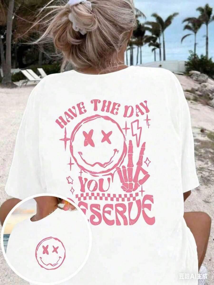 Camiseta gráfica de verano para mujer 'Ten el día que te mereces' - Transpirable, de manga corta y cuello redondo, con diseño de cara feliz y letras, ropa casual de moda para el verano. - Blanco - Ver 1