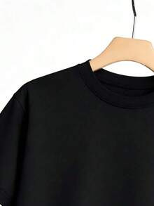 Camiseta de cuello redondo y manga corta para mujer de color negro, con patrón de cerezas rojas en toda la prenda, decoración de lazos de leopardo y rojos, dulce y alegre, ideal para uso diario. XQ3N - Negro - Ver 4