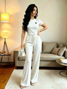el mejor regalo para el Día de la Madre:Conjunto deportivo de mujer con top corto de manga corta y pantalones acampanados con cintura anudada, para primavera/otoño - Blanco - Ver 3