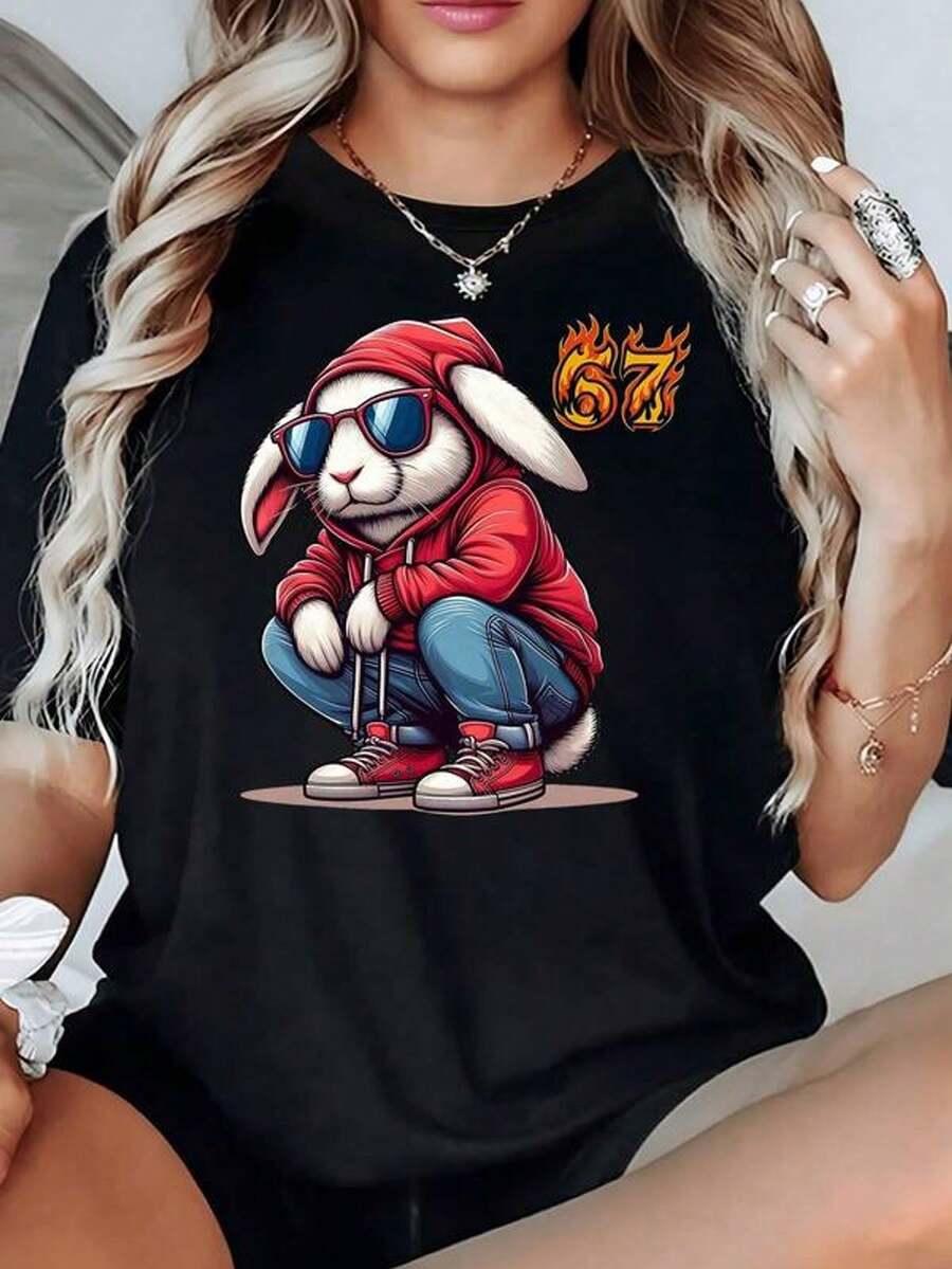 Anthropomorphic Rabbit Wearing A Red Sweatshirt With The Number 67 In Flames, Symbolizing Youthful Energy And Urban Attitude. Women's T-Shirt, 100% Cotton, 220g - Black - View 1
