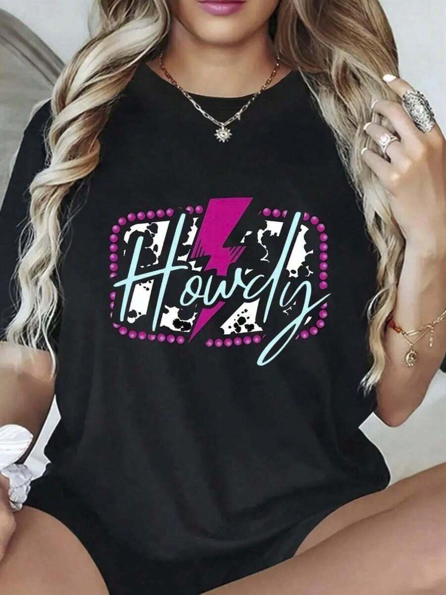 Camiseta con estampado de vaca y rayo eléctrico TeeHowdy - Camiseta de manga corta con cuello redondo, estilo casual y holgado para mujer, súper suave y transpirable, ideal para verano, primavera y otoño - Perfecta para conciertos de country, festivales de música, eventos de rodeo occidental, ropa deportiva casual de verano para mujer y ropa de verano para vacaciones. Camiseta de manga corta / tee de manga corta 100% algodón. - Negro - Ver 1