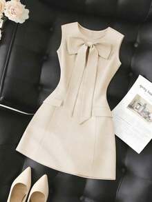 Vestido de mujer de unicolor, cuello redondo, ajustado, con lazo delantero y sin mangas - Albaricoque - Ver 1