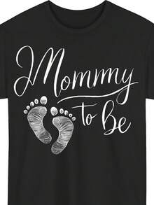 Camiseta de Anuncio de Embarazo para Mujeres Embarazadas - Camiseta de Manga Corta con Cuello Redondo para Mujer con Diseño de "Futura Mamá" y Huella - Adecuada para Uso Casual en Primavera, Otoño y Verano. - Negro - Ver 1