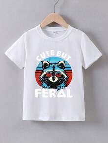 Camiseta Blanca Clásica para Niños, Suave y Transpirable, de Algodón, Manga Corta, Básica, Nee Doh, Graduación de Jardín de Infantes, 4 de Julio para Niñas, Artículos para Niños, Ropa Niño, Camisetas con Estampados Gráficos, Ropa Linda, Ropa de Niña, Camisetas Y2k, Camiseta de Verano de Manga Corta para Niños con un Genial Estampado de Mapache de Dibujos Animados con la Frase 'Cute But' Impresa, Tela de Algodón Suave y Lisa, Garantiza una Experiencia de Uso Cómoda, Ideal para Atuendos Casuales y Básicos Diarios para Niños. Regalos Personalizados, Regalos de Pascua para Niños, Recuerdos de Fiesta para Niños, Regalos para Niños, Amigos y Familiares. - Negro - Ver 1