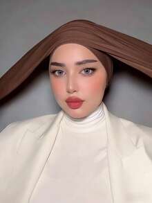 1 chiếc khăn trùm đầu turban 2 trong 1 cổ điển dành cho nữ, thiết kế xếp ly nhiều lớp giúp tôn dáng đầu, được làm từ vải jersey cao cấp, thấm hút mồ hôi và thoáng khí, phù hợp cho sinh hoạt hàng ngày và các hoạt động ngoài trời của phụ nữ Hồi giáo. - Nhiều màu - Xem 7
