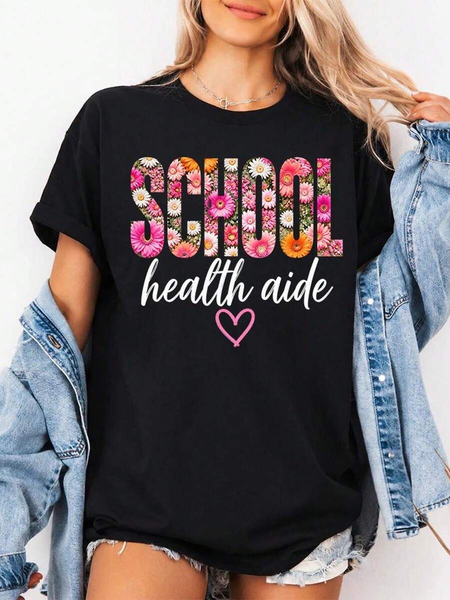 School Health Worker T-Shirt, Floral Print T-Shirt, Gift For Nursing Assistant, Gift For School Staff, Thank You T-Shirt For Assistants, School Office T-Shirt. Unisex T-Shirt Made Of 220g Pure Cotton, Ideal Weight For All Seasons, Suitable For Both Men And Women. Durable, High-Quality Fabric, Soft To The Touch And Long-Lasting. Breathable Top. Suitable For Women In Spring And Summer, Holidays, Mother's Day, Independence Day. - 黑色 - 查看 1