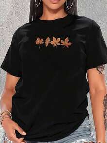Playera de mujer de algodón suave con estampado gráfico de hojas otoñales, cuello redondo, estilo casual, manga corta, ideal para primavera, verano y otoño - Negro - Ver 6