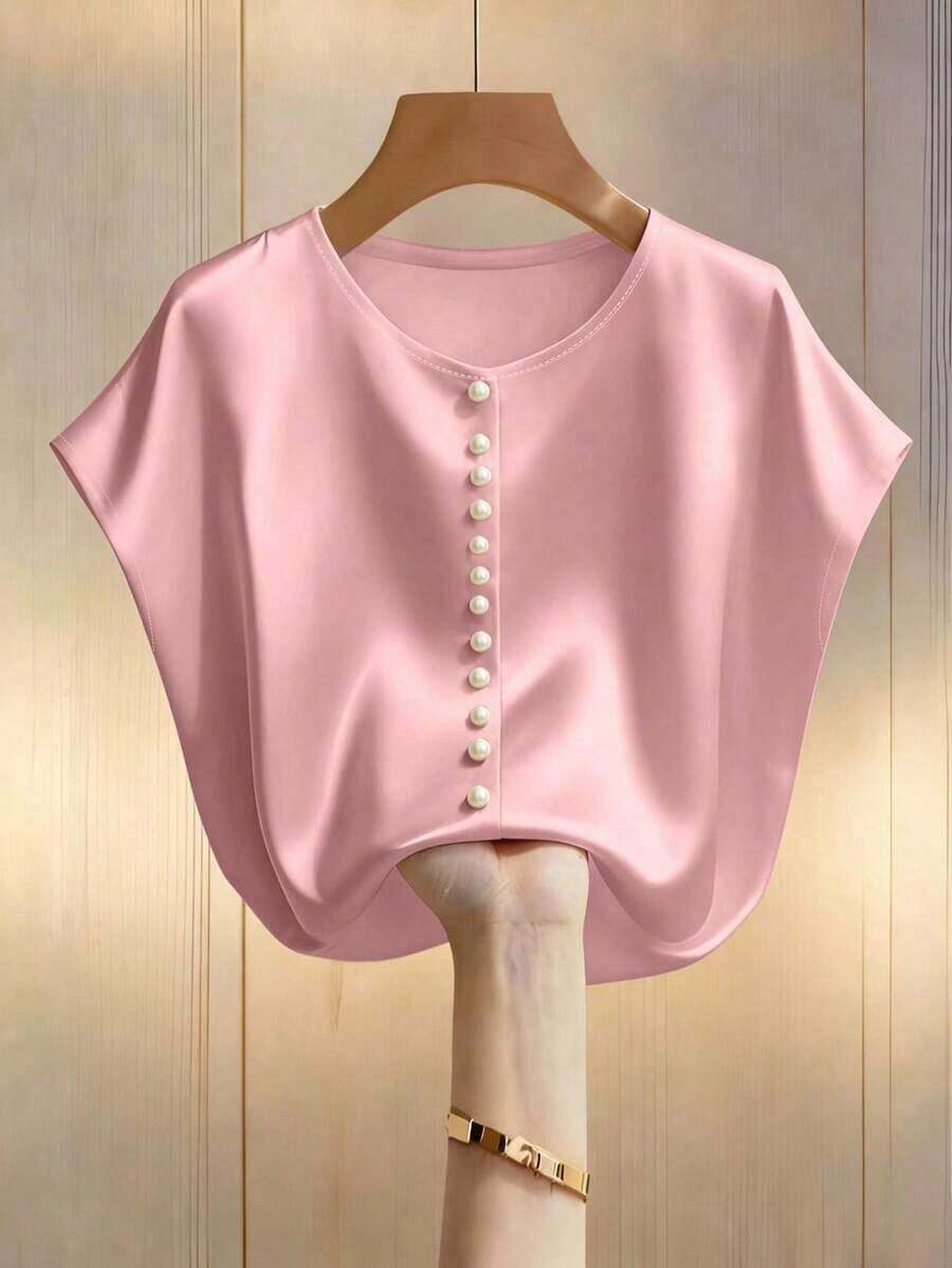 Blusa elegante de mujer con mangas de murciélago en color champán, cuello redondo decorado con perlas y manga corta, de tela de satén, adecuada para ir a trabajar y uso diario elegante - Rosa - Ver 1