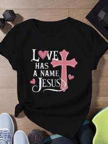 Camiseta de manga corta para mujer, sencilla y versátil, estampada con el diseño "Love Jesus", talla estándar, adecuada para uso diario en casa, en la oficina y para ocasiones informales, hecha de algodón. - Negro - Ver 1