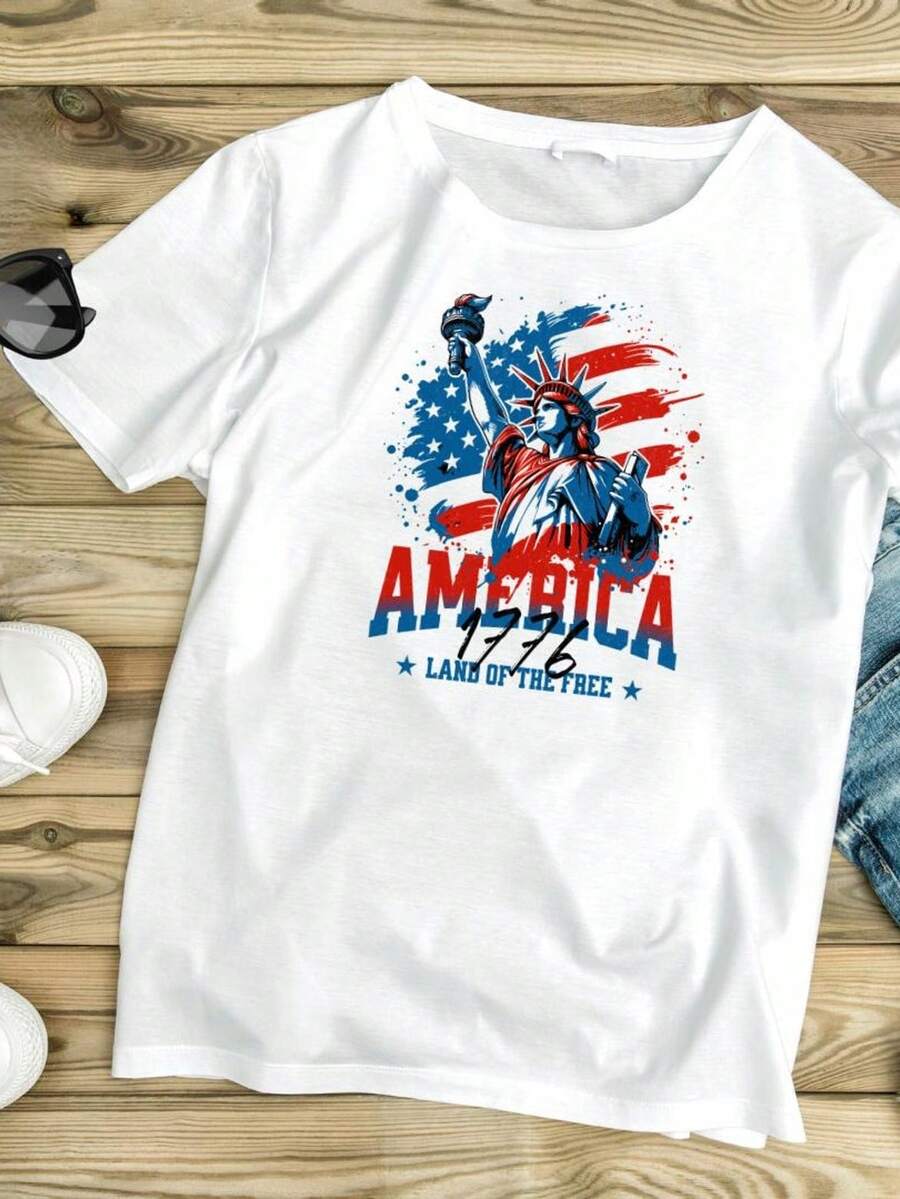 Camiseta gráfica de la Estatua de la Libertad AM1erica Land of the Free. Camiseta unisex de algodón puro de 220 g. Peso ideal para todas las estaciones, apta tanto para hombres como para mujeres. Tejido duradero de alta calidad, suave al tacto y de larga duración. Parte superior transpirable. Adecuada para la primavera y el verano de las mujeres, vacaciones, Día de la Madre, Día de la Independencia. - Blanco - Ver 1