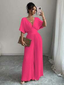 Mono de mujer elegante con cuello en V profundo, mangas tipo murciélago y plisados, de unicolor - Rosa Fucsia - Ver 7
