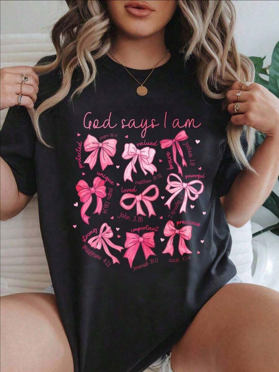 Camiseta Casual de Manga Corta para Mujer - "Dios Dice Que Estoy Aquí" con Lazos Rosados y Versículos Bíblicos, Cuello Redondo, Top de Verano, Lavable a Máquina, Camisetas para Damas, Ropa Casual, Estilo Moderno, Ajuste Cómodo
-Blanco - Negro - Ver 1