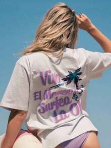 Promoción de nuevo lanzamiento: Camisetas divertidas, camisetas minimalistas de algodón para mujer, camisetas con letras para mujer, camisetas oversize para mujer, camiseta oversize con estampado de palmera y eslogan "Viva El Momento Surfea La Ola" estilo Y2K, ropa casual de calle, camiseta de manga corta con cuello redondo, top estampado vintage retro de surf, atuendo de verano para vacaciones en la playa, uso diario, cita para tomar un café, fiesta, moda de vacaciones para adolescentes, camiseta gráfica holgada y moderna para mujeres jóvenes y amantes del surf. CEZO - Blanco - Ver 1