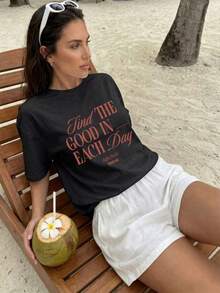 Camiseta Casual de Mujer de Punto con Cuello Redondo y Manga Corta, con Estampado Inspirador, Hombros Caídos y Largo Regular JELT - Negro - Ver 1