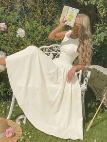Vestido color albaricoque con cuello redondo, sin mangas, con ribete de contraste, lazo decorativo en la cintura y bajo acampanado - Albaricoque 2 - Ver 7