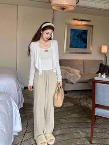 Bộ 2 món áo hai dây dệt kim + áo khoác cardigan ngắn cho nữ, kiểu dáng dễ thương ngọt ngào như nàng tiên, áo cardigan dệt kim dài tay màu trắng, áo hai dây dệt kim thắt nơ, trang phục layering ôm sát dáng người nhỏ nhắn với họa tiết rỗng. - trắng - Xem 6