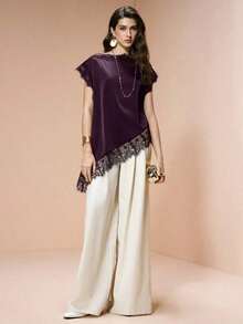 Blusa de mujer , de tela de piqué con lunares en blanco y negro, con empalme de encaje de unicolor y bajo asimétrico, elegante para citas y atuendos de verano - Morado - Ver 4