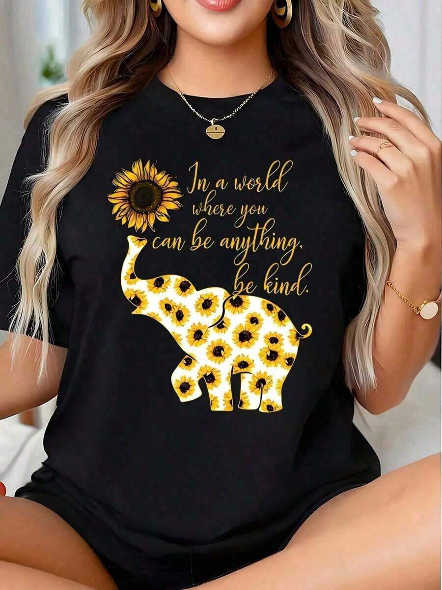 Camiseta de manga corta con cuello redondo y estampado de elefante de PremiumSunflower, con el mensaje inspirador "En un mundo donde puedes ser cualquier cosa, sé amable", ropa casual e idea - Negro - Ver 1