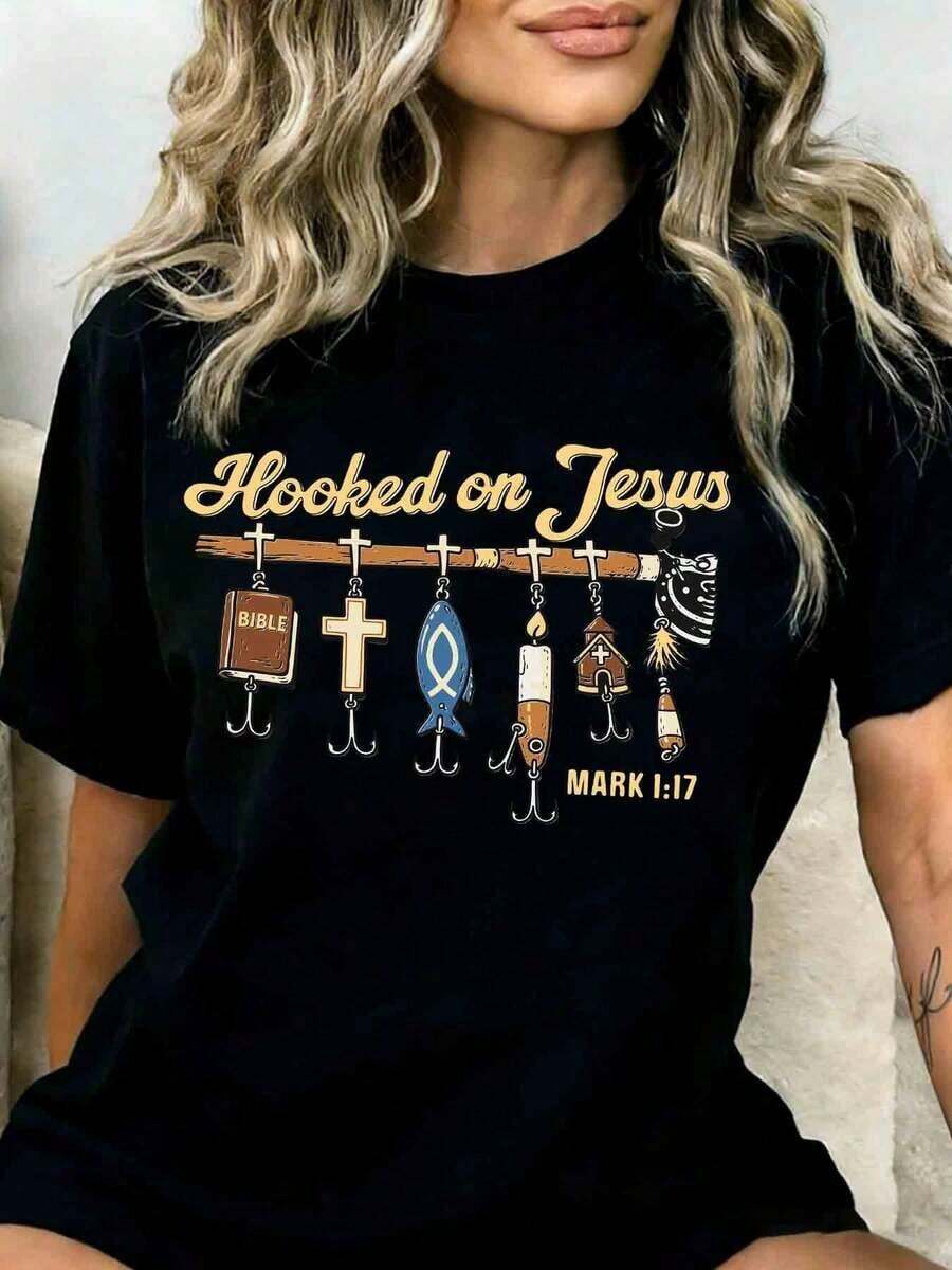 1 Christian Fishing T-Shirt With Cross And Fish Design, With The Phrase "Hooked On Jesus", According To Mark 1:17, Religious Gift For Women And Men, Faith Inspired Clothing, 180g, 100% Cotton. - 黑色 - 查看 1
