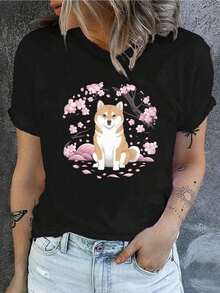 Camiseta Casual de Manga Corta para Mujer con Cuello Redondo, con un Diseño de Shiba Inu en un Bosque de Cerezos, Perfecta para Primavera y Verano, 100% Algodón - Negro - Ver 7
