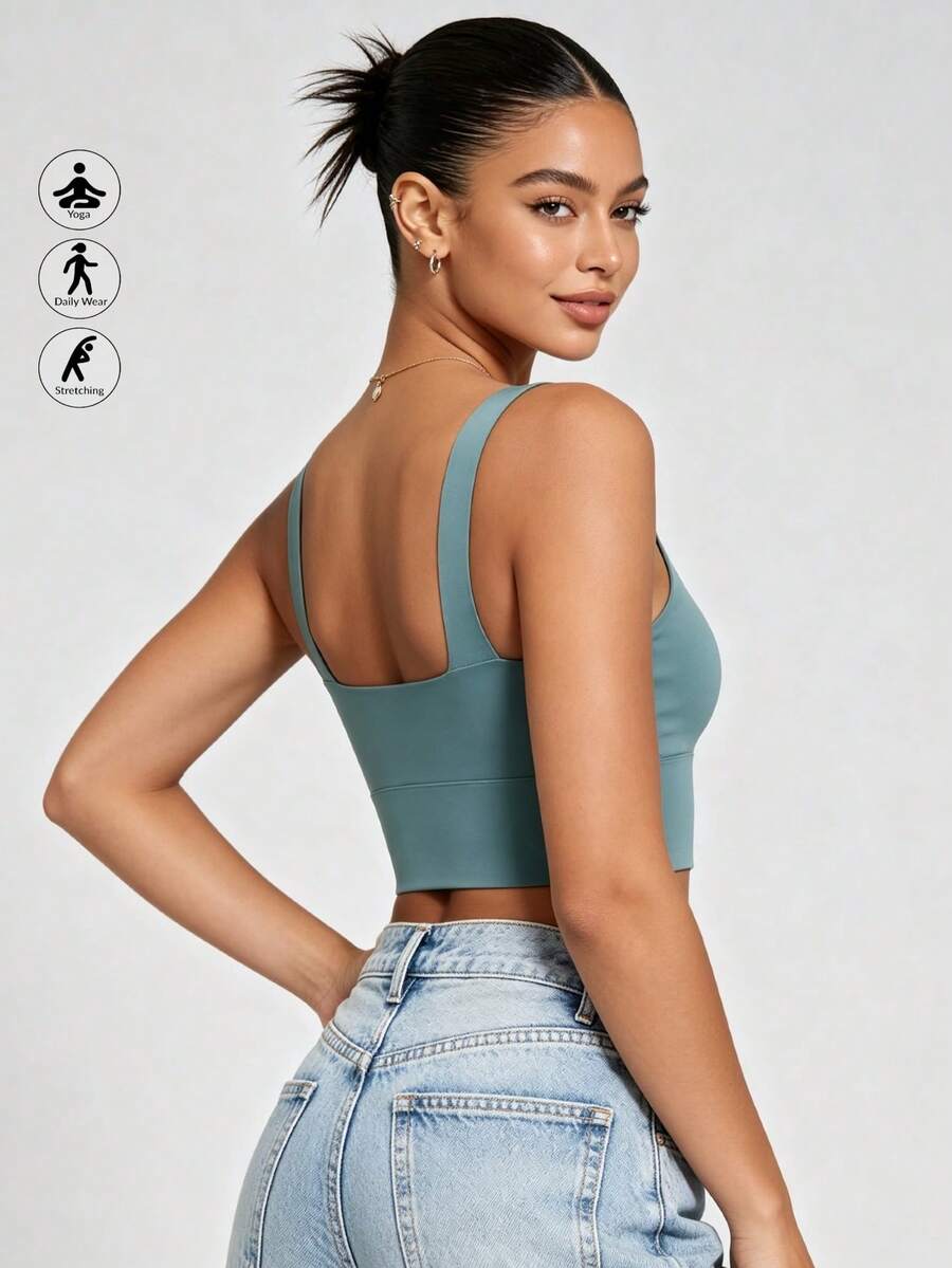 Runway Rest Top de yoga transpirable con sujetador deportivo con función de absorción de impactos y recogida que le da una hermosa forma de espalda, top de entrenamiento para gimnasio - Turquesa - Ver 1