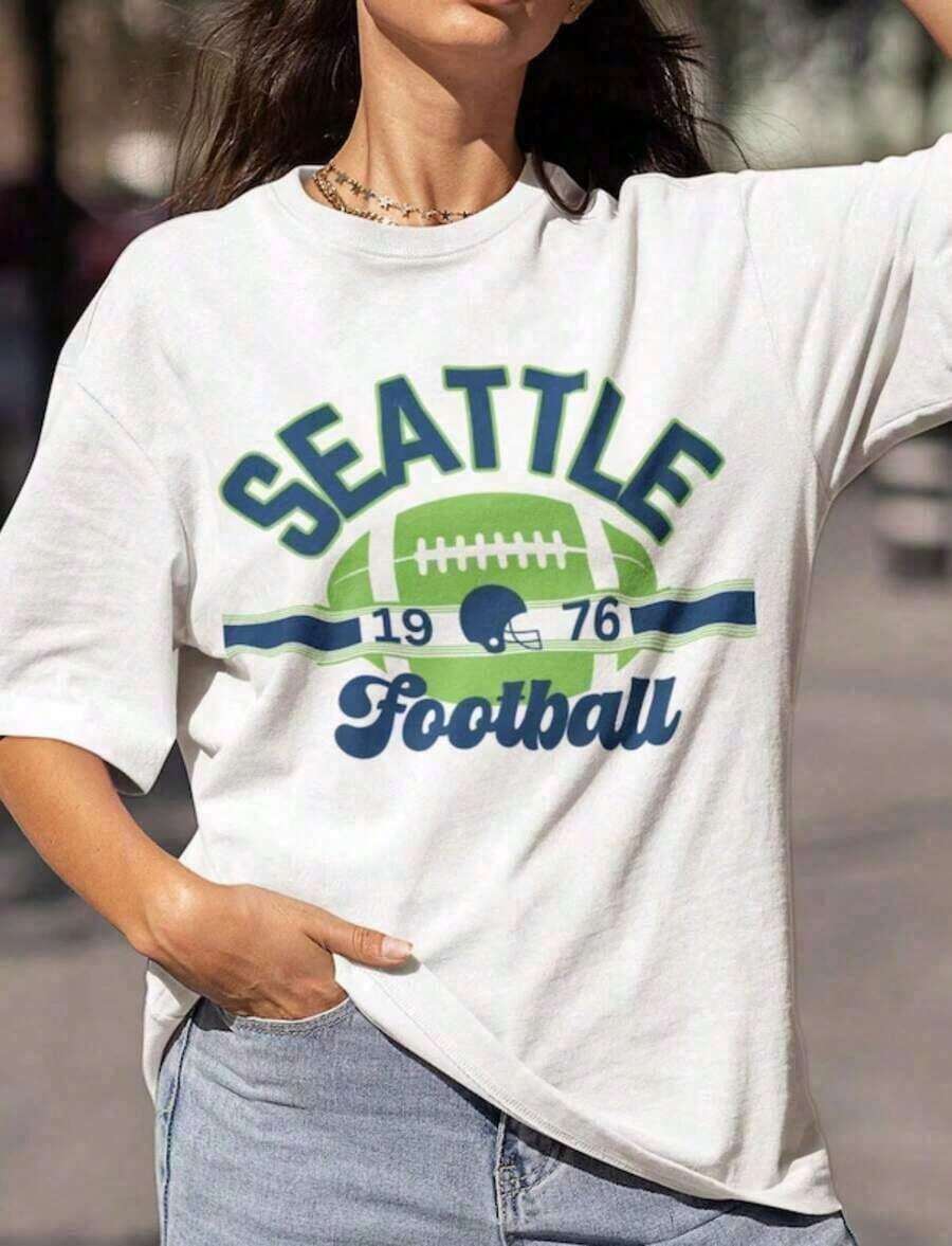 Camiseta de manga corta, suave, SeahawksSvgSeahawksLeopardoSvgVayaSeahawksSvgSeahawksFútbolSvgSeahawksvgMascota,EscuelaSvgDxf,Eps,Png,PDFS, VintageVeranoTopsParaMujeres-UnisexoSuelto-AjusteCómodoVintageCalle-EstiloAlgodónT-CamisaCamisa de mujer de alta calidadCasual 100%Algodón 100%Algodón - Blanco 3 - Ver 1