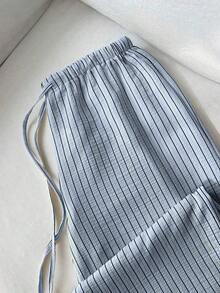 1 pieza Pantalones casuales de mujer a rayas amarillas, tela de burbujas arrugada, cintura súper baja con cordón, pantalones rectos de ajuste relajado, casual y romántico - Azul - Ver 1